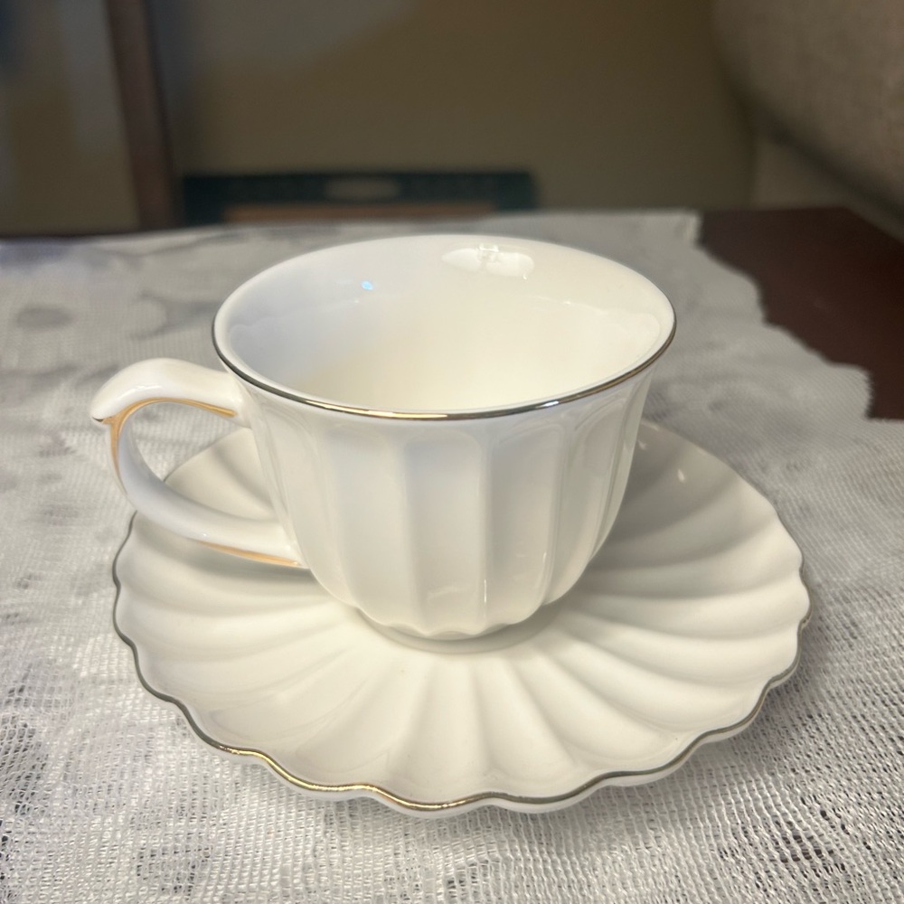 Elegant White Teacup and Saucer Set